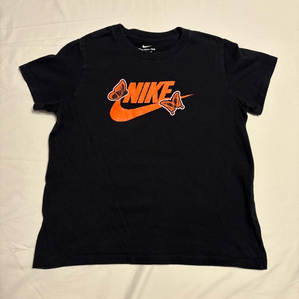 Black Nike T-shirt featuring an orange butterfly graphic logo - Picture 1 of 6